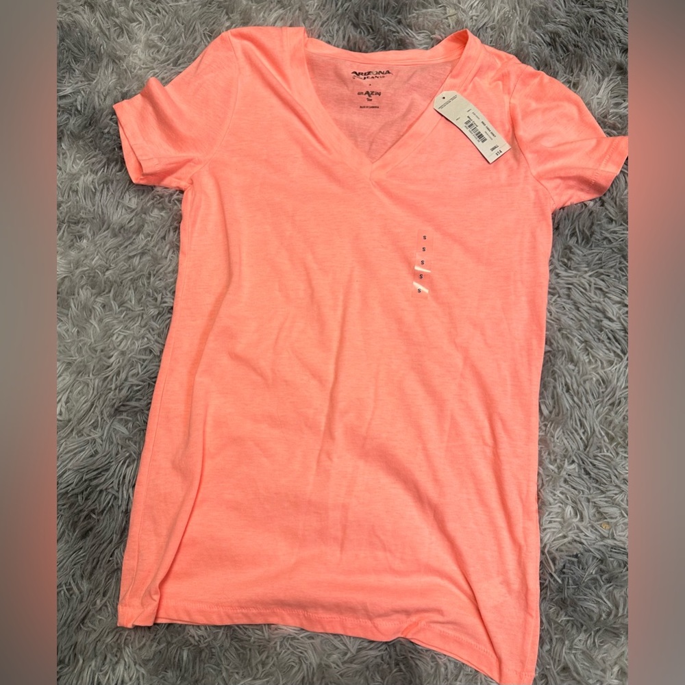 Bright melon colored T-shirt